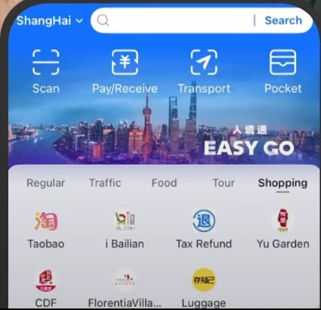 Shanghai Easy Go Shopping Features - Screenshot showing Taobao, i Bailian, Tax Refunds and Yu Garden shopping options in the platform interface
